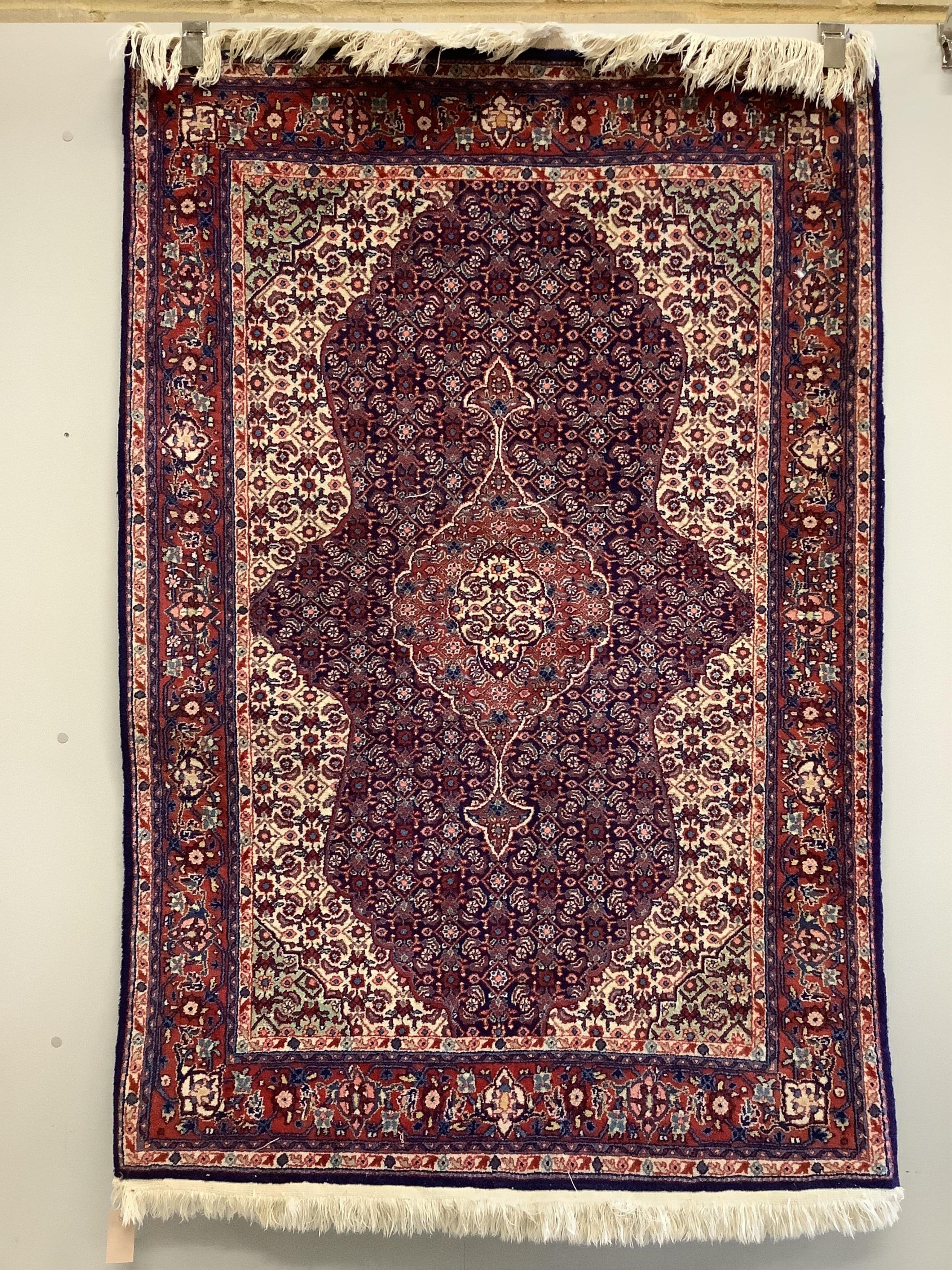 A North West Persian rug, 156 x 109cm. Condition - good